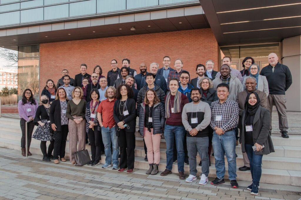 iHARP attendees stand in front of the ILSB building before the event. 