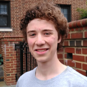 Image of Louis Lapp outside in a brick courtyard