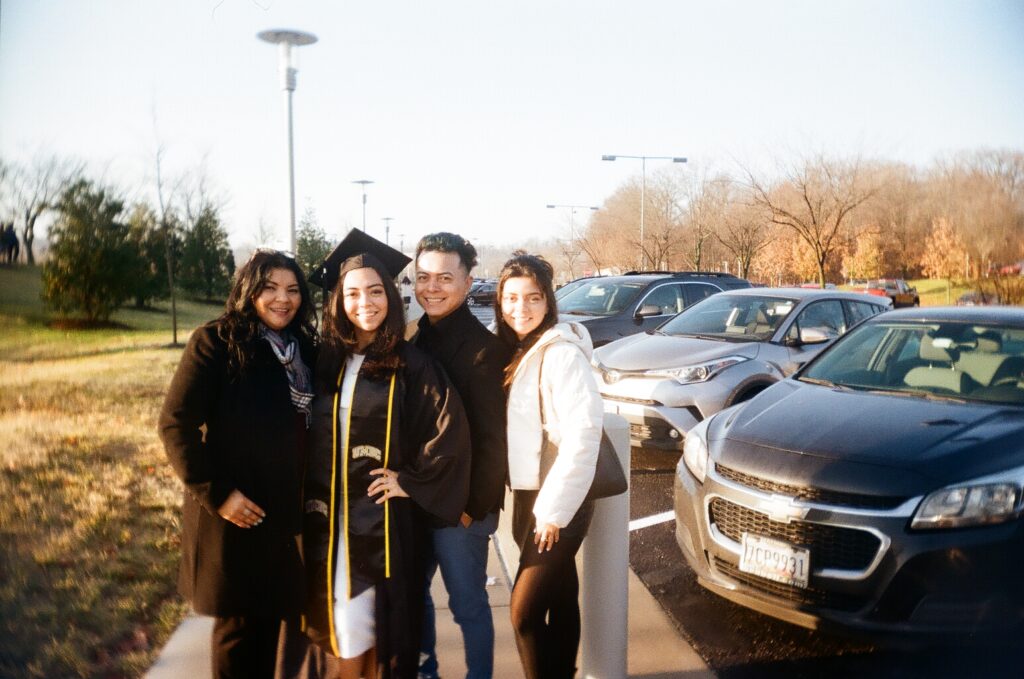 photo of a family celebrating commencement on the UMBC campus