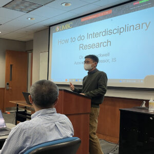 Dr. Zhiyuan Chen presenting at event on campus