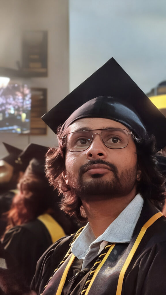 Shourya Rami in his cap and gown during graduation
