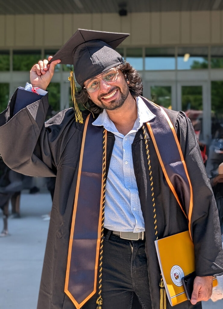 Shourya Rami in his cap and gown during graduation